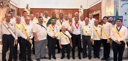 Members of several councils and assemblies near Mérida, Mexico South — including State Deputy René Sansores (front row, fourth from left) and other officers from the Mexico South State Council — gather following a Columbus Day Mass on Oct. 12 at Santa Ana Parish. Father Edilberto López Chan, pastor and chaplain of Benedicto XVI Council 18211, celebrated the Mass, which was followed by a reception. About 100 people attended, including more than 40 Knights.