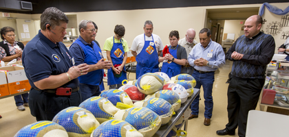Knights of Columbus Council in Kaufman Texas prays over turkeys to be distributed to those in need.