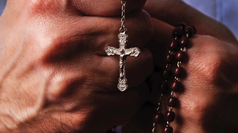 Hands with rosary
