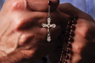 Hands with rosary
