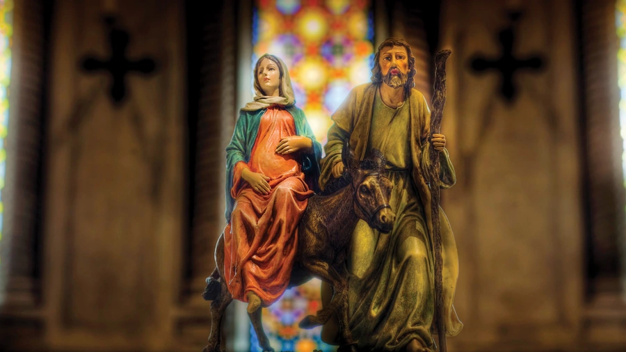 A sculpture showing an expectant Mary with Joseph en route to Bethlehem is seen in a church during the season of Advent