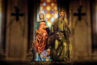 A sculpture showing an expectant Mary with Joseph en route to Bethlehem is seen in a church during the season of Advent