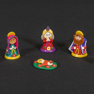 Crèche from Ecuador made of painted bread dough with the Holy Family, an angel, a donkey, and an ox.