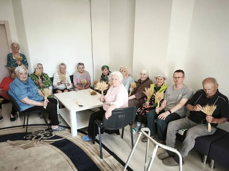 Residents participate in an art therapy session at the Kovcheh shelter in Rakulove, Ukraine, in August 2024. The facility is supported by a grant from the Knights of Columbus.