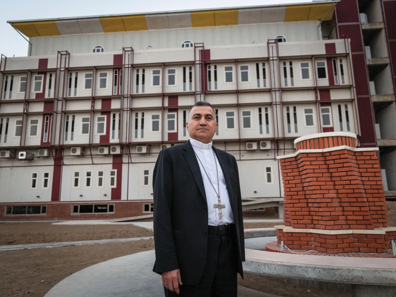 Chaldean Catholic Archbishop Bashar Matti Warda of Erbil, Iraq, stands in front of McGivney House in 2018.
