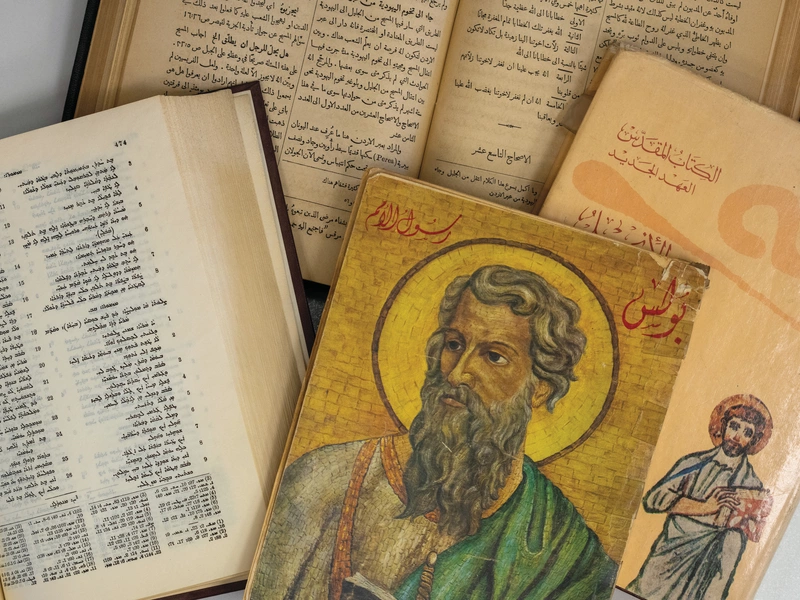Christian books written in Arabic and a Bible in Syriac (left) are pictured in the library of Mar Qardakh International School in Erbil, Iraq.