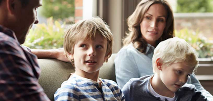 Parents having a critical conversation with their children.