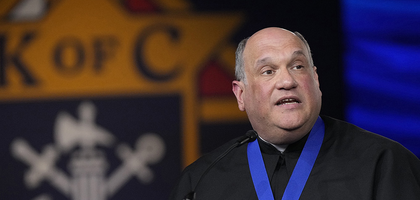 Ken and Mary Ann Duppong of Glen Ullin, North Dakota, parents of Servant of God Michelle Duppong, speak during the Supreme Knight’s Awards Session after receiving the 2025 International Family of the Year award on Aug. 4 — the couple’s 52nd wedding anniversary. (Photo by Paul Haring)