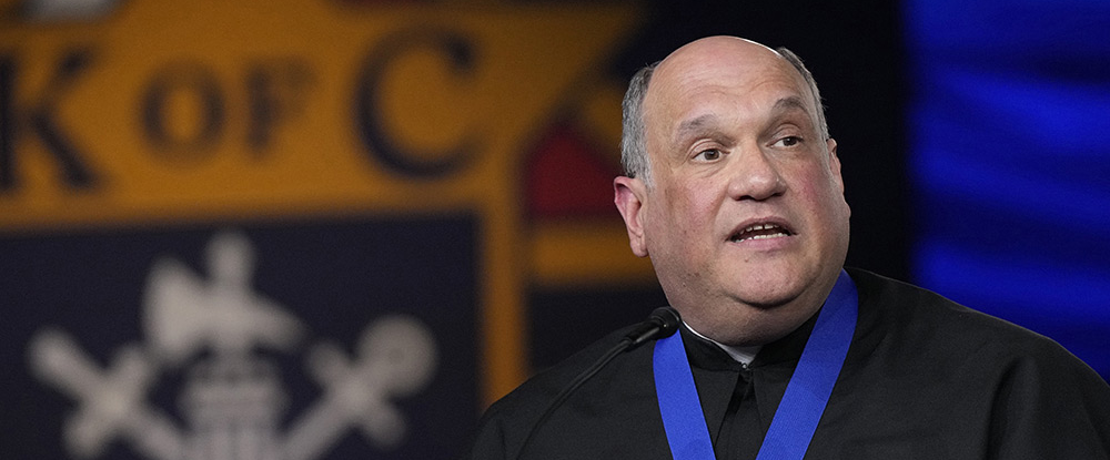 Ken and Mary Ann Duppong of Glen Ullin, North Dakota, parents of Servant of God Michelle Duppong, speak during the Supreme Knight’s Awards Session after receiving the 2025 International Family of the Year award on Aug. 4 — the couple’s 52nd wedding anniversary. (Photo by Paul Haring)
