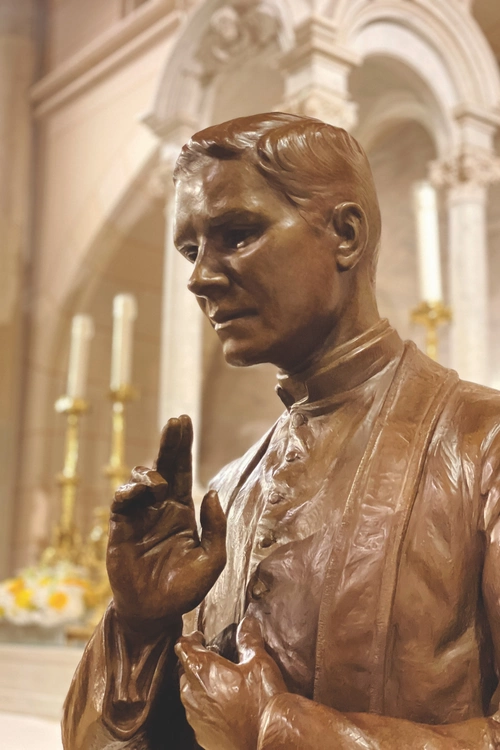 A bronze statue of Blessed Michael McGivney  is pictured in St. Patrick&rsquo;s Cathedral in New York City.