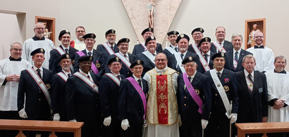 Fourth Degree Knights from several local assemblies gather with Father Robert Rocha (center), faithful friar of East Kansas City Assembly 3861 in Blue Springs, Mo.