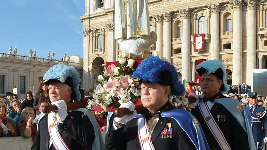 Supreme Master Dennis Stoddard and a Fourth Degree honor guard lead Marian procession through St. Peter's Square in 2013