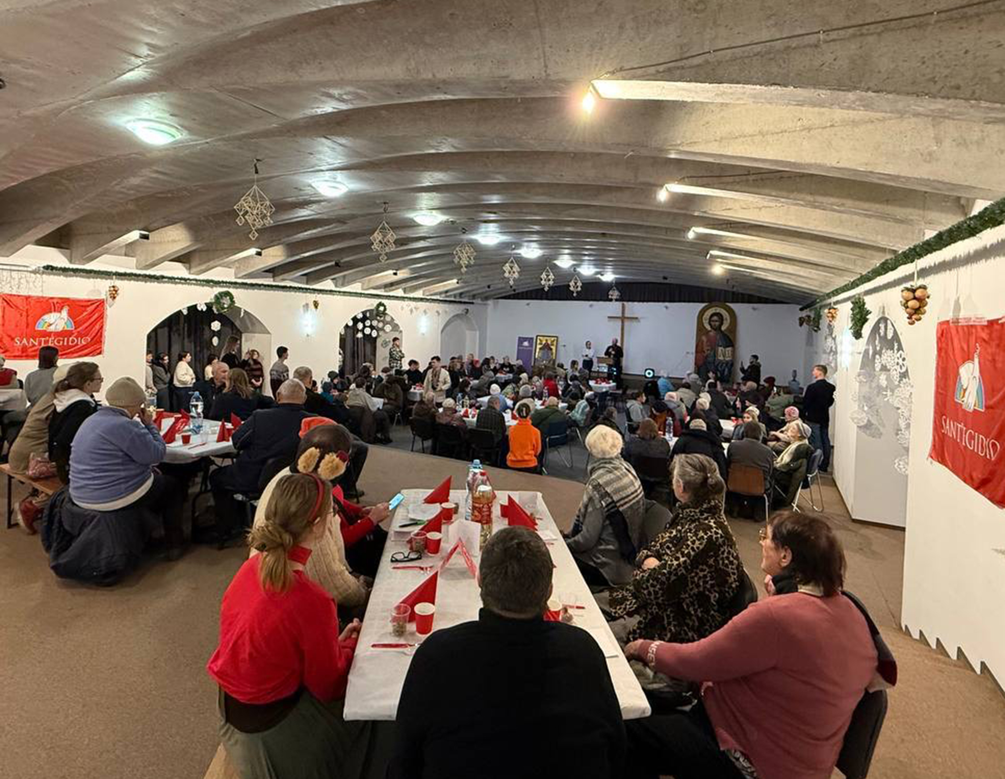 People in need attend a dinner at the Patriarchal Cathedral of the Resurrection of Christ in Kyiv, Ukraine.