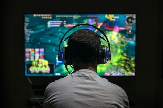 Young man playing a video game