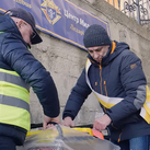 Knights unpack a generator during a delivery at a parish in Ivano-Frankivsk, Ukraine.