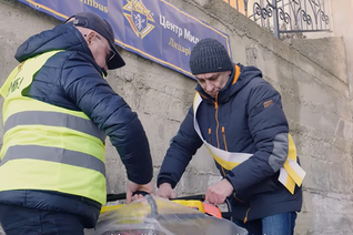 Knights unpack a generator during a delivery at a parish in Ivano-Frankivsk, Ukraine.