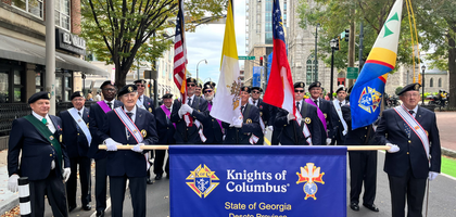 Fourth Degree Knights from several assemblies in Georgia participate in the annual Georgia Veterans Day Parade in Atlanta. 