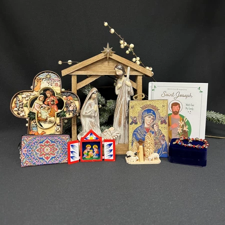A collection of items for purchase at teh Pilgrimage Center Gift Shop, books, statues, rosaries, ornaments.