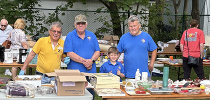 Grand Knight Nick Kapular (right) and other members of Father Fenelon Council 10878 in Fenelon Falls, Ontario, oversee the council’s yard sale and barbecue at St. Aloysius Church. Selling items donated by parishioners and the Knights, the council raised $2,200 for church maintenance and local charities. All leftover items were donated to the local Salvation Army and Humane Society thrift stores.