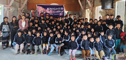 Children from displaced Myanmarese families gather at Sacred Heart Church in Kalaymyo, Myanmar, wearing new jackets donated by St. Felix Council 16466 of Indianapolis. 