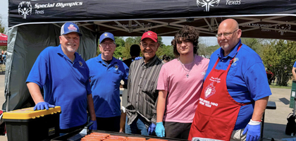 Knights from Ascension Bastrop (Texas) Council 14943 cook hot dogs for athletes and volunteers at a Special Olympics Texas soccer tournament in Bastrop.