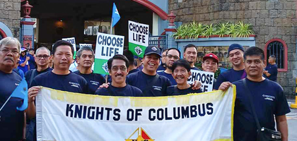 Members of Holy Family Council 6071 in Mandaluyong City, Luzon North, stand together before walking in a March for Life organized by Knights in the Diocese of Cubao with help from the Luzon North State Council. More than 1,400 people participated in the demonstration.