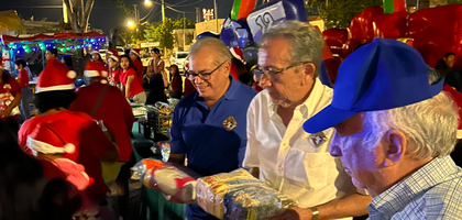 Members of Mons. Fernando Ruiz Solorzano Council 13963 in Mérida, Mexico South, distribute toys and food to more than 60 families served by La Virgen del Árbol community kitchen in the Dzununcán precinct. 