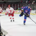 John Scott (right), an eight-year veteran of the NHL, takes a shot on goal during the 2025 NHL Alumni Game.