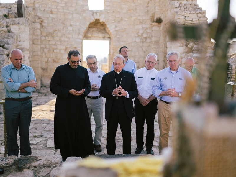 Archbishop Lori leads the delegation in prayer at St. George Greek Orthodox Church in the village of Taybeh, West Bank.