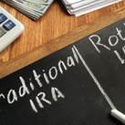 A chalkboard is used to deliberate about IRAs.