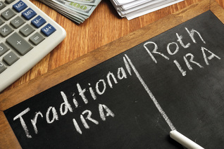 A chalkboard is used to deliberate about IRAs.