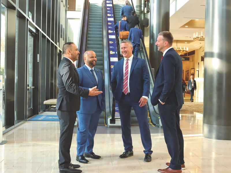 Knights of Columbus insurance agents and Supreme Council employees converse during the annual Field Agent Sales Conference.