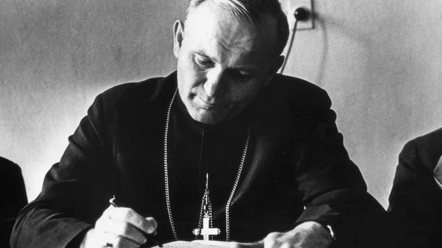 Karol Wojtyła writing when he was a Bishop