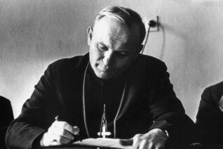 Karol Wojtyła writing when he was a Bishop