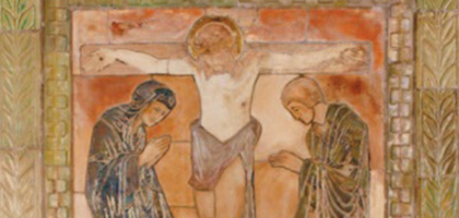 Stations of the Cross mosaic with Jesus on the cross.