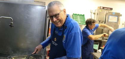 Don Briskey, a member of Queen of Peace Council 9263 in Salem, Ore., prepares eggs during a K of C breakfast fundraiser to aid a parish staff member who was recently diagnosed with thyroid cancer.