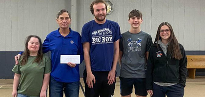 Grand Knight Ed Brosh (second from left) of St. Teresa of Calcutta Council 12036 in Charles Town, W.Va., presents a donation of $600 — proceeds from the council’s fund drive for people with disabilities — to athletes and volunteers from Special Olympics of the Eastern Panhandle. The council raised $2,500 through its annual fundraiser, supporting Special Olympics, Jefferson County Schools, Mountaineer Academy of Excellence and St. James Summer Camps. The council has organized the fundraiser for more than 20 years.