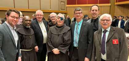 Members of Father Scollen Council 8258 in Cochrane, Alberta, gather with a few Franciscan friars who are also brother Knights during the annual Padre Night. 