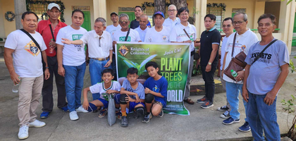 Knights from Dr. Jose Rizal Council 5507 in Calamba, Luzon South, and students from Central 2 Elementary School gather for a planting project at the school. 