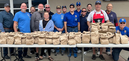Knights from several San Diego councils prepare nearly 700 bag lunches for athletes, coaches, and volunteers at the Regional Special Olympics Spring Games. 