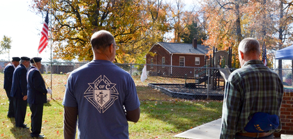 Deputy Grand Knight Mike Reynolds of Holy Cross Council 8509 in Kernersville, N.C., looks on during a flag retirement ceremony at Holy Cross Catholic Church. Fourth Degree Knights from Pope John Paul II Assembly 3017 stood at attention as 35 U.S. flags were honorably retired in accordance with the U.S. Flag Code. The ceremony has been organized annually for more than 10 years.
