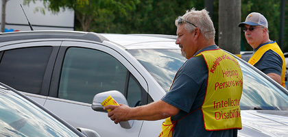 Past Grand Knights Jim Newtoff (left) and Bob Sajewski of Father C.C. Boyle Council 4698 in Tinley Park, Ill., collect donations for the council’s 55th annual fund drive for people with disabilities at the intersection of 171st Street and Harlem Avenue. The council raised $45,000 to support Special Olympics Illinois and religious education programs at several churches.