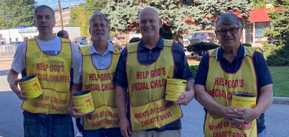 Knights from Coeur de Leon Council 87 in Framingham, Mass., stand outside St. Tarcisius Parish after Mass to collect donations for the council’s annual fund drive for people with disabilities. Over six weeks, more than $5,000 was collected and donated to the Massachusetts State Council to support children with disabilities.