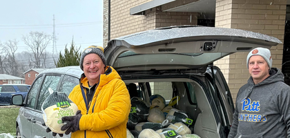 Knights from Pius XII Council 4925 in Monroeville, Pa., gather outside Christ the Divine Parish Hall to distribute turkeys, milk and butter to families in need of a Christmas dinner. The council has organized this project for more than 55 years, preparing and distributing 90 food baskets in 2025.