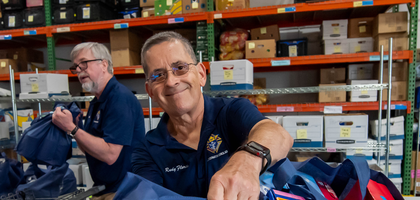 Rudy Flores (right) and Rob McNamee of St. Louis Martin Council 15256 in Ashburn, Va., deliver food donations from the council’s monthly food drive to Loudoun Regional Food Pantry. The council has held monthly food drives for more than 10 years and collected a record 8,700 pounds of food in November. (Photo by Matthew Barrick)