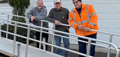 Knights from South Plainfield (N.J.) Council 6203 stand behind a handicap ramp they installed at the home of a brother Knight’s daughter. Since 2008, the Knights have installed 25 ramps and automatic lifts for community members in need.