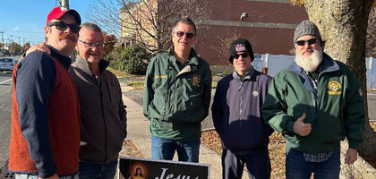 Members of Our Lady, Queen of Peace Council 12592 in Hainesport, N.J., gather behind a “Jesus, I trust in You” sign outside an abortion clinic in Cherry Hill during a 40 Days for Life vigil. Knights from 15 councils across the Camden and Trenton dioceses participated in the 40-day campaign, including a dedicated hour together every Saturday morning.