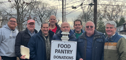 Knights from Mother Seton Council 5427 in Washington Township, N.J., gather outside Helping Hand Food Pantry after delivering donations from the council’s annual winter food drive. The council collected about 200 bags of food and more than $2,000, which were donated to Helping Hand and Our Lady of Good Counsel Parish’s food pantry. The council has organized summer and winter food drives since 1963.