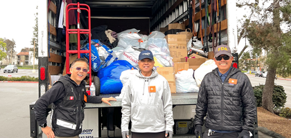Members of Good Shepherd Council 9076 in San Diego gather in front of a truck after loading items collected during a council-sponsored drive to benefit Father Joe’s Villages, which serves people experiencing homelessness or who are otherwise in need.