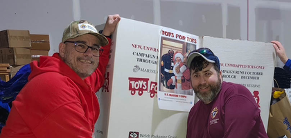 Knights from St. Matthew Council 14360 in Norwalk, Conn., display toys at Norwalk Toys for Tots’ warehouse after dropping off donations. The council collected about 100 toys during a drive at St. Matthew Parish, and Knights also helped pick up donations from more than 100 collection sites around the area.